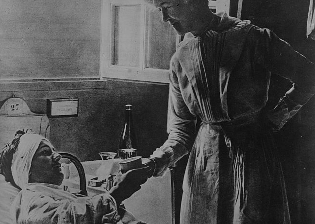 Woman in hospital bed - 1900