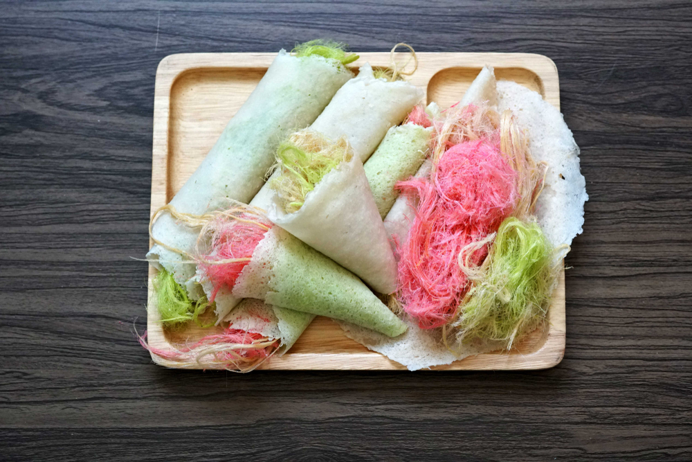 Cotton candy burrito pancake (Roti Saimai) on plate