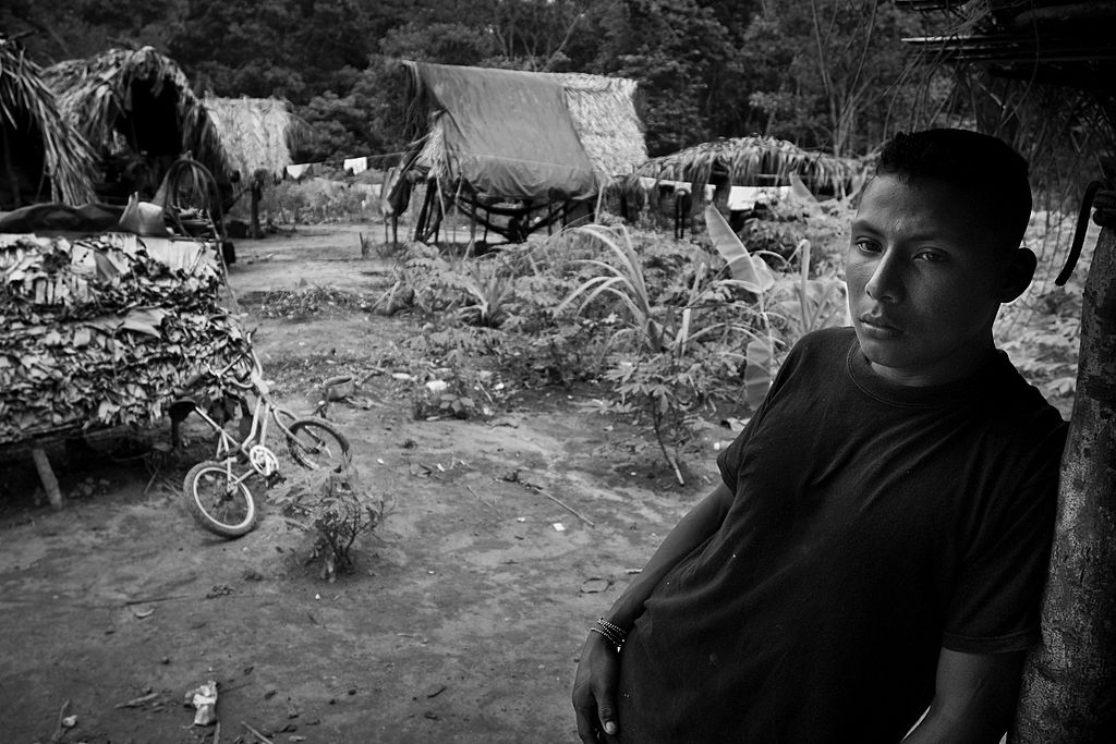 A young Nukak boy in a refugee settlement