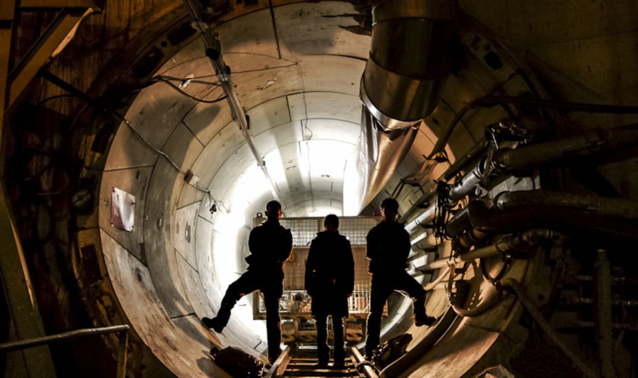 Urban Explorer in the entrance of technical gallery