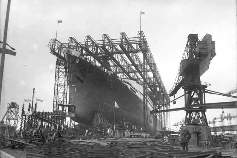 Grayscale Close Up Photo of TS Bremen while under construction