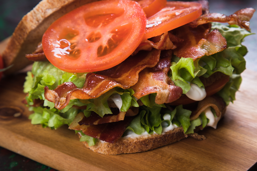 A close up of a BLT sandwich