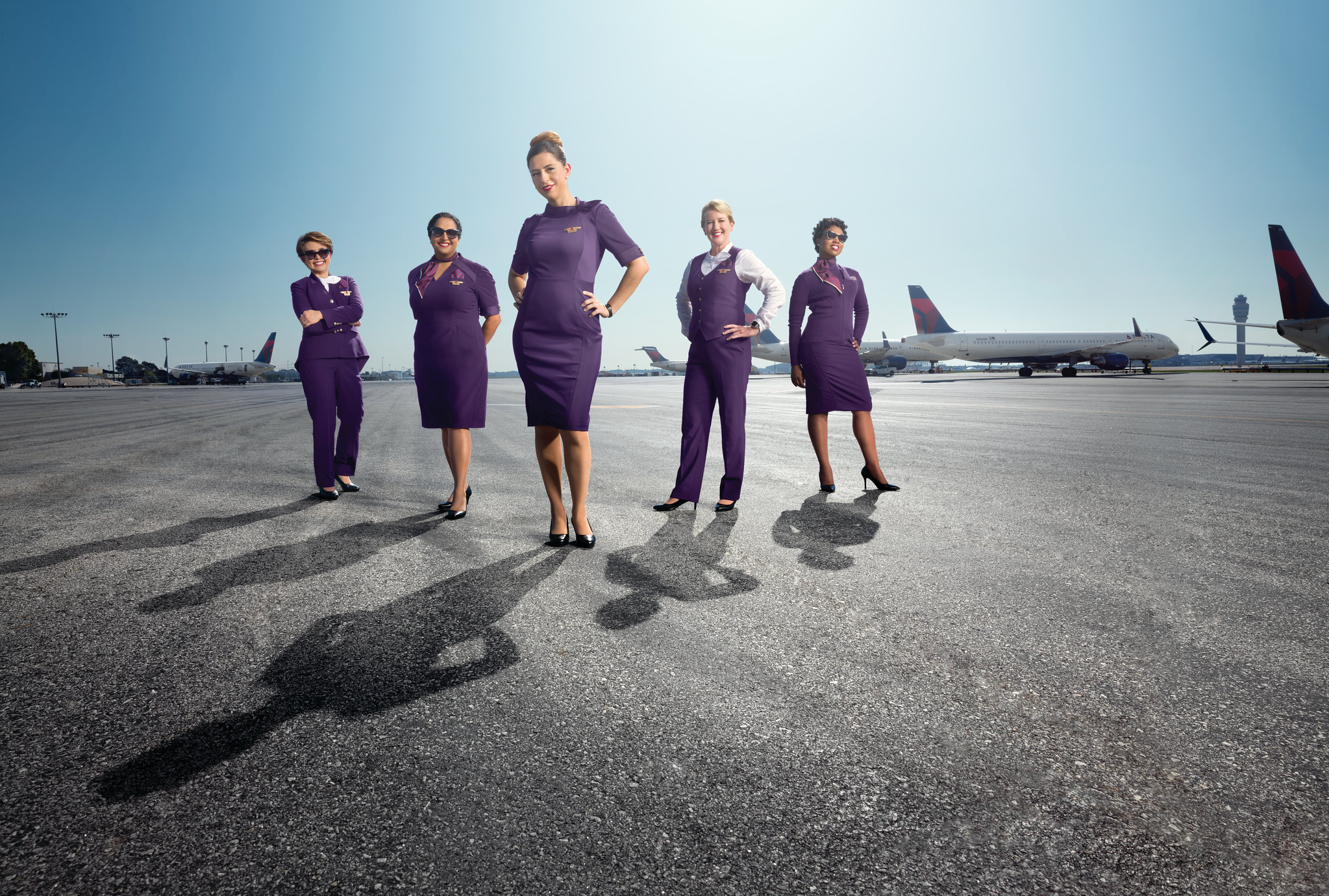 Female Flight attendants posing outdoors