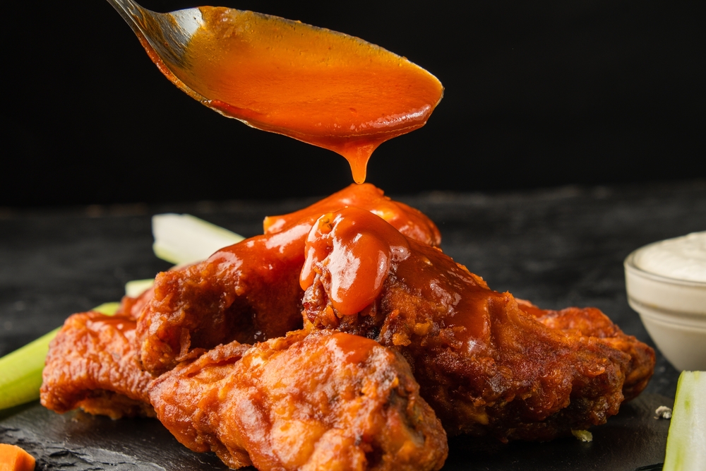 Classic buffalo wings and sauce