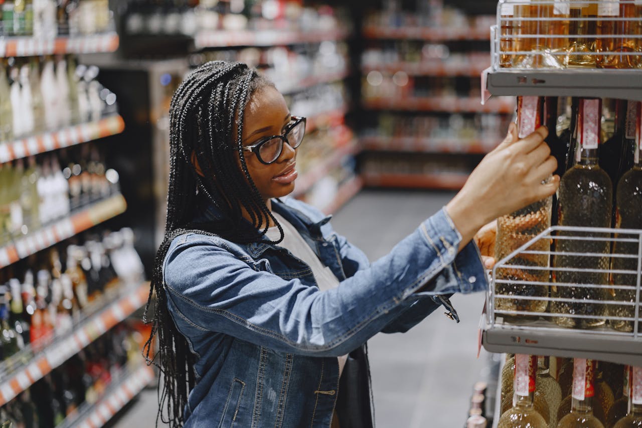 Woman Shopping for Wine in Grocery Store