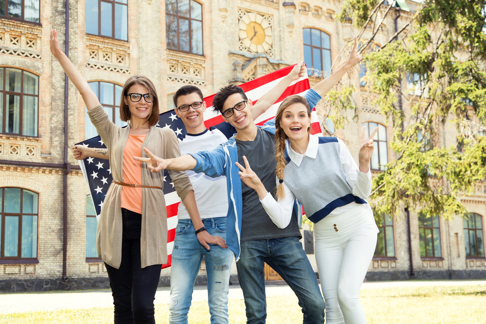 Group of students holding flag of USA