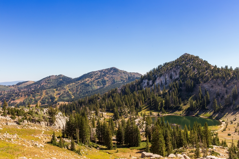 Aerial View of Lake Catherine's Clear Waters and Rugged Peaks