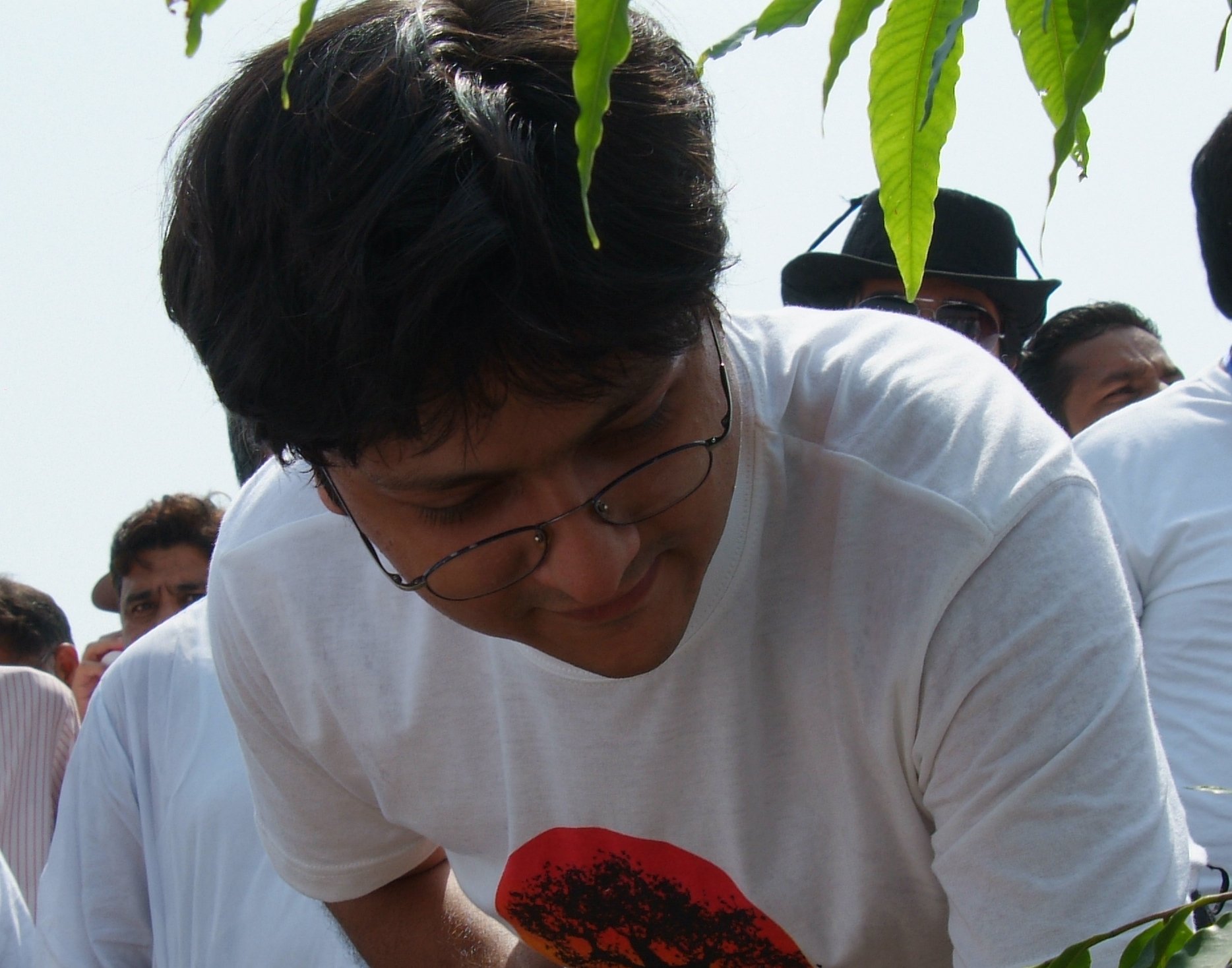 Shahzada Dawood planting a tree