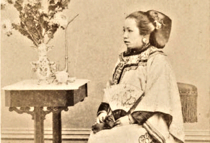 Photograph of a Chinese woman seated