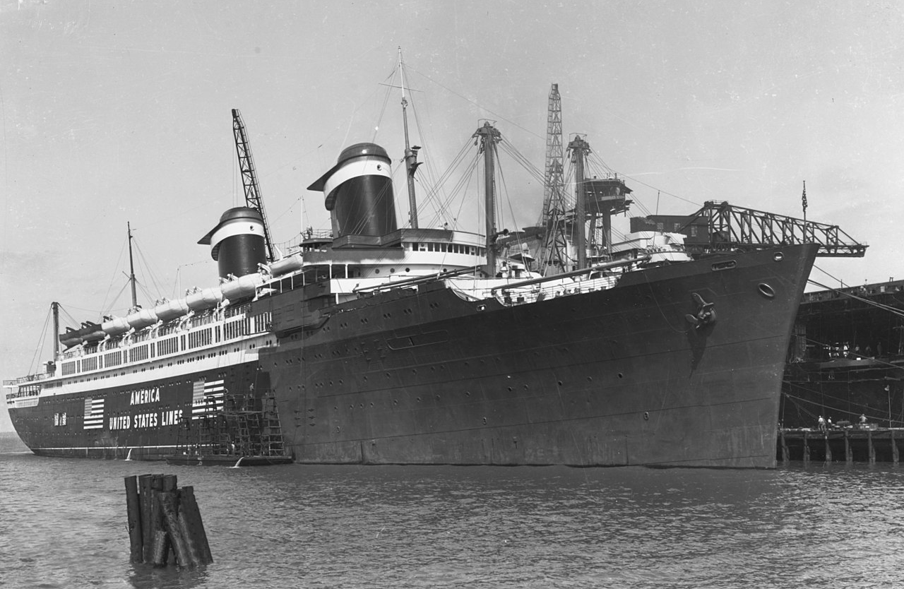 USS West Point (AP-23) being repainted for naval service