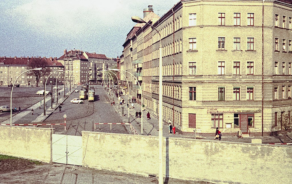 Photo of Buildings in Berlin and the Berlin Wall.