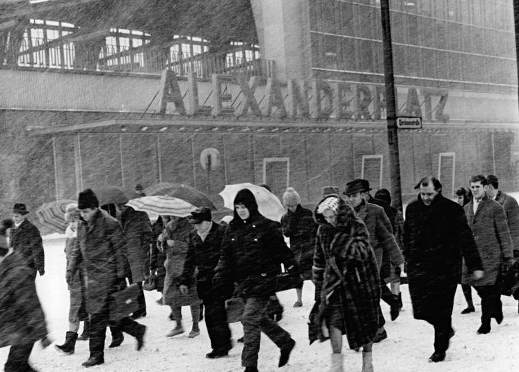 Grayscale Portrait Photo of Berliners back in winter attire 1966