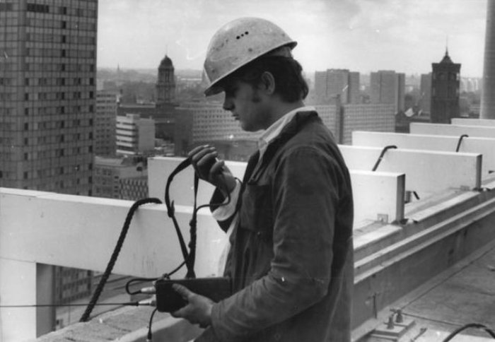 Photo shows construction worker Bernd Schulz on a construction site