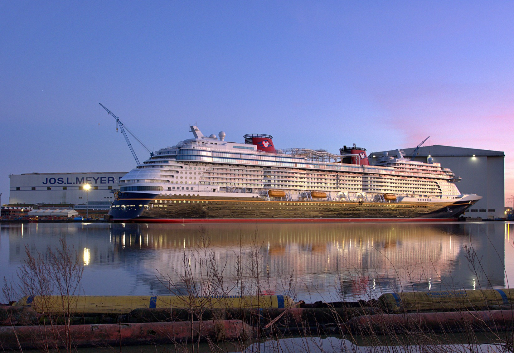 Disney Wish in Papenburg after sunset