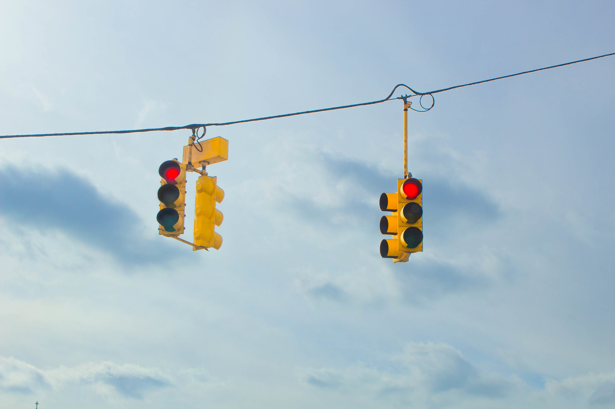 Traffic Lights hanging up on a wire