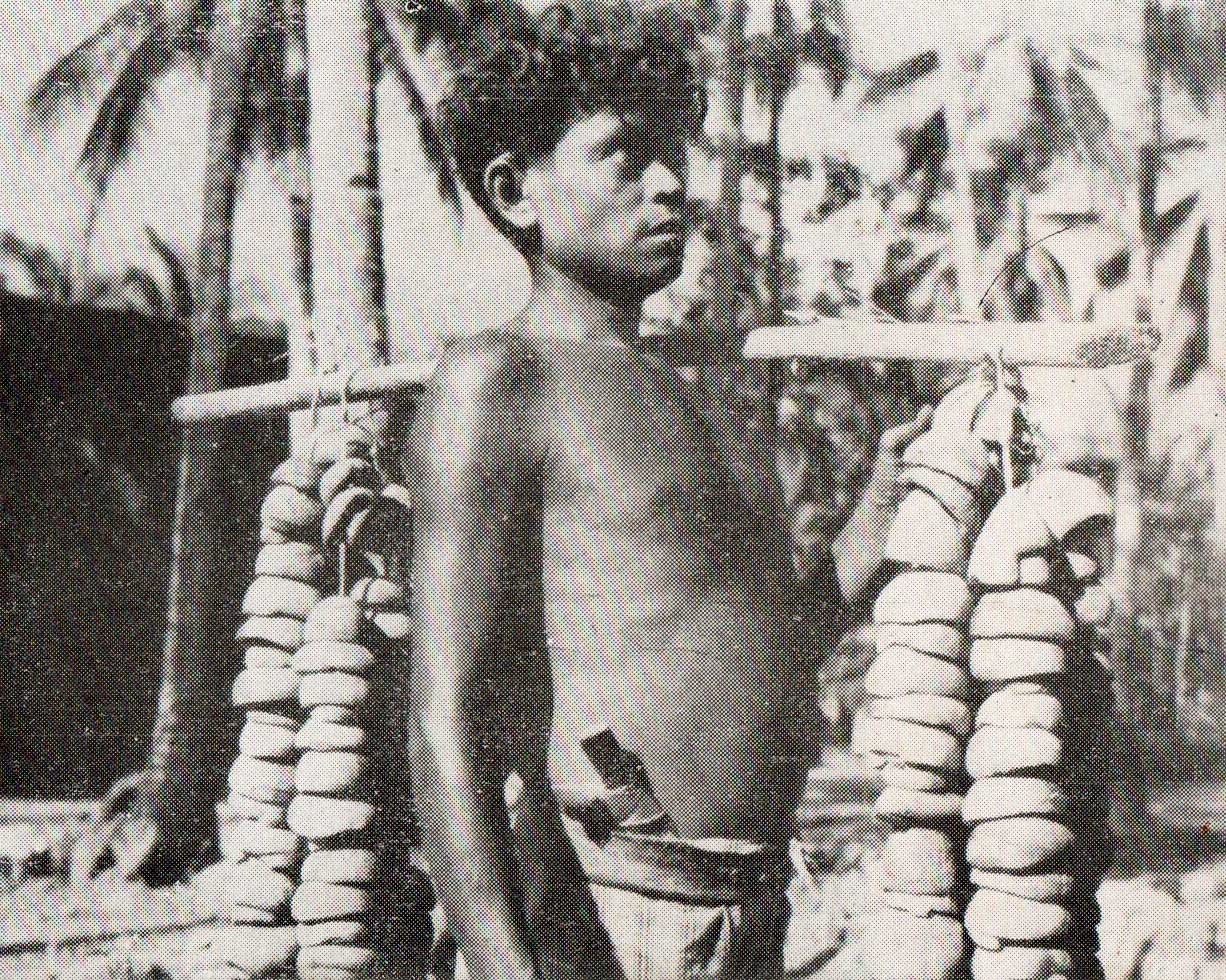 Carrying copra home - circa 1958