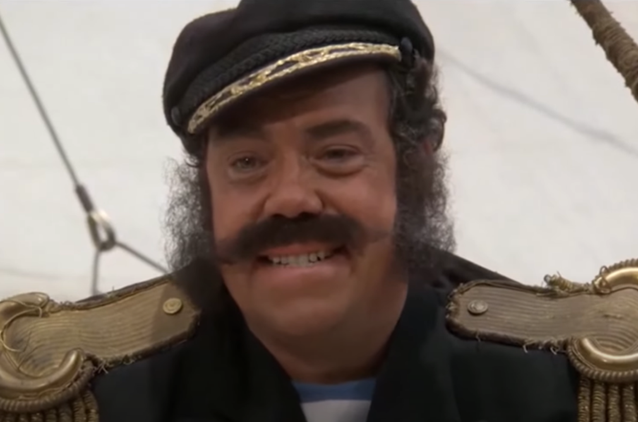 Screenshot of John Schuck (Capt. Efraim Longstocking) smiling from - The New Adventures of Pippi Longstocking (1988)