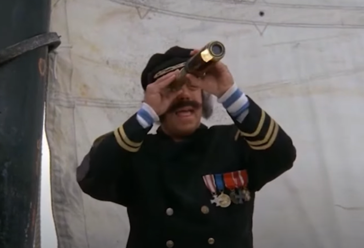 Screenshot of John Schuck (Capt. Efraim Longstocking) smiling from - The New Adventures of Pippi Longstocking (1988)