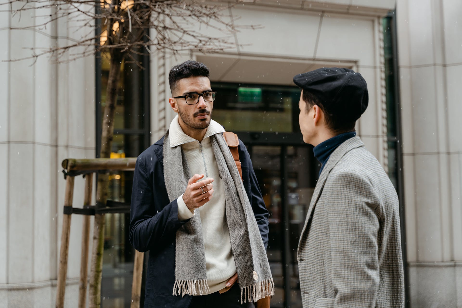 Businessmen Talking outside of a Building
