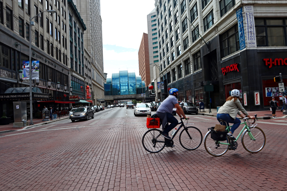 Bicyclists passing a street in Indianapolis, Indiana