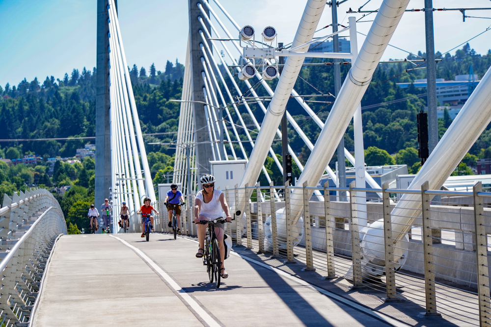 Bicycle riders on the Tilikum Bridge
