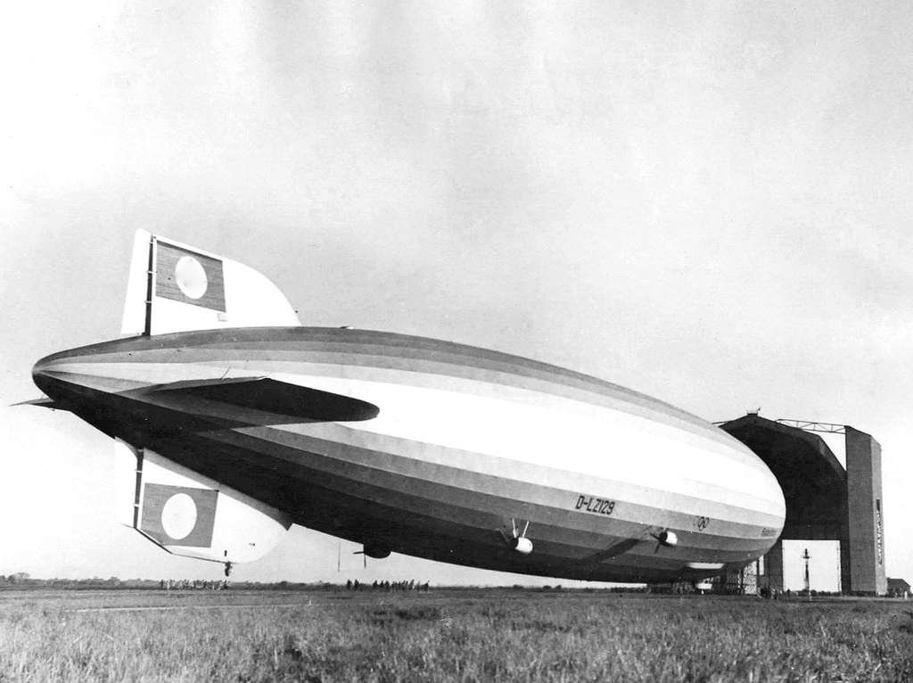 Hindenburg in Rio 1936 - A black and white photo of a large blimber