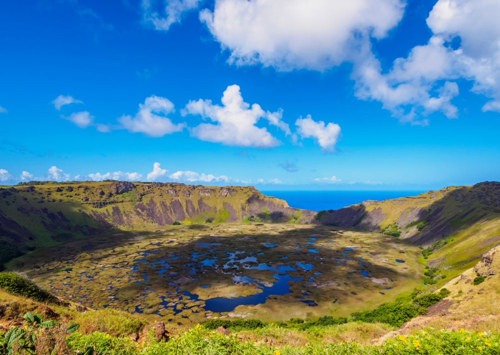 This image showcases the breathtaking beauty of Rano Kau, a volcanic crater lake on Easter Island