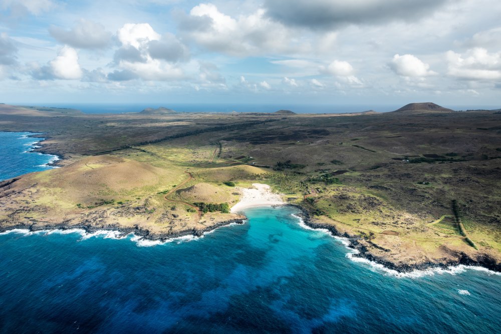An aerial view of Easter Island (Rapa Nui) captures its rugged beauty and pristine coastline