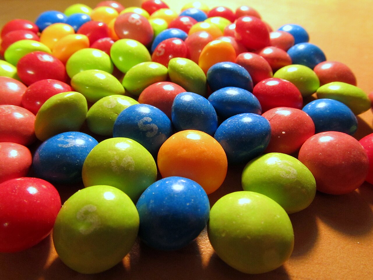 A lot of Skittles in a variety of colors