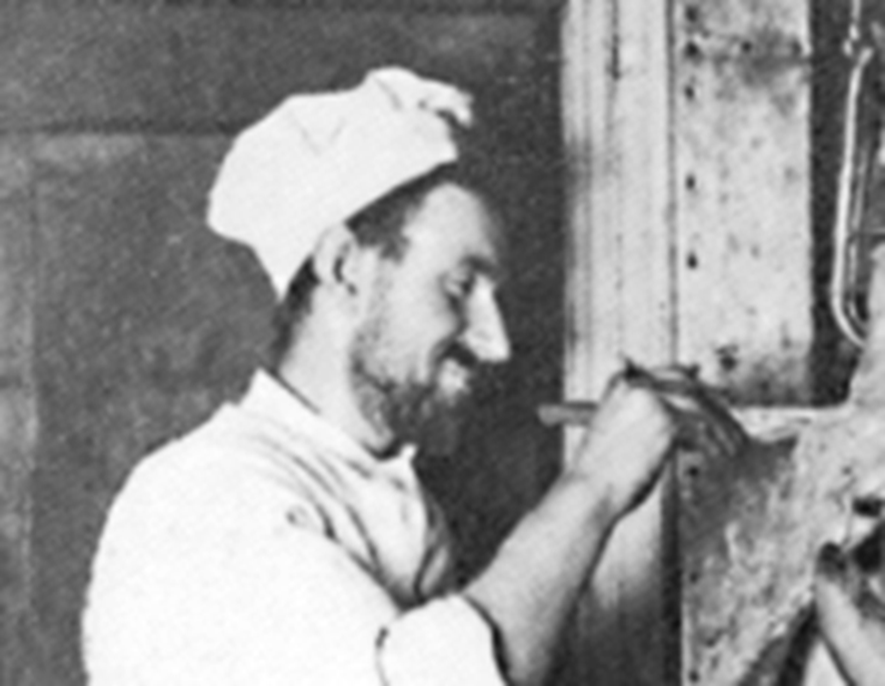 Charles Green, the Endurance's cook, preparing a penguin - 1914
