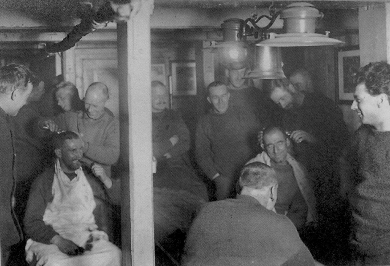The crew having their hair cut on board Endurance - circa 1914