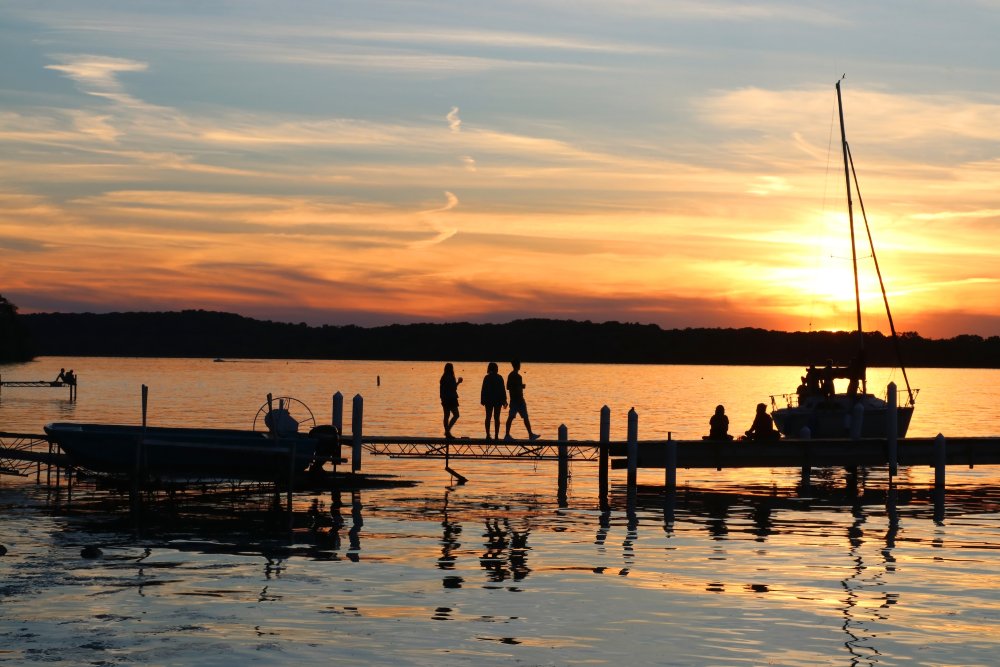 Summer sunset over the lake Mendota pier in the city of Madison