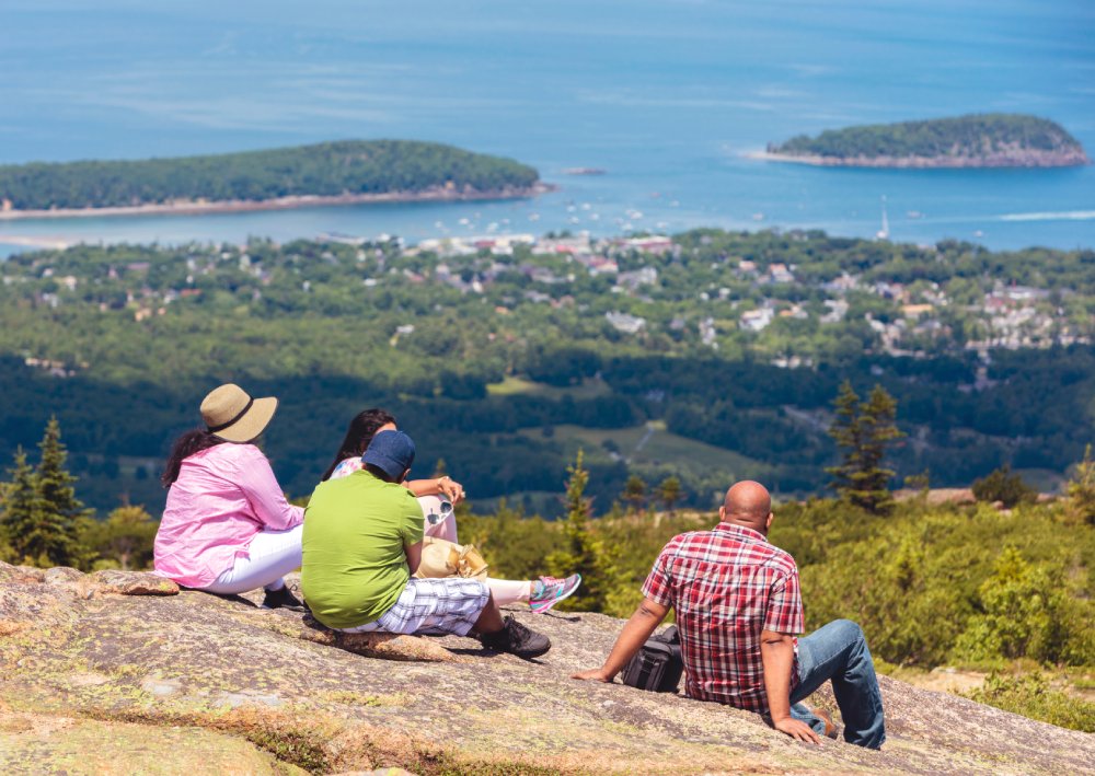People Sitting on Rocks above Bar Harbor in Main