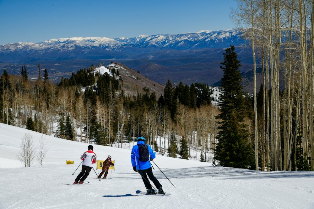 Enjoying skiing downhill at Park City Canyons Ski Area in Utah