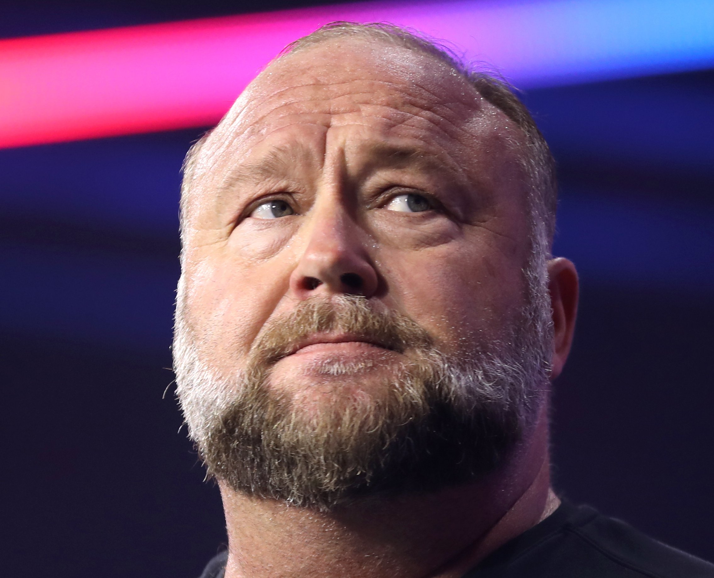 Alex Jones speaking with attendees at The People's Convention