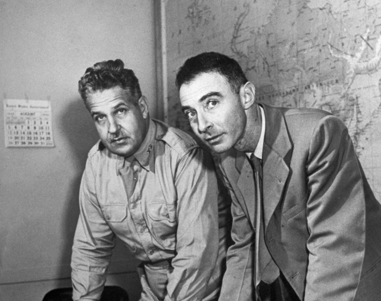 Grayscale Portrait Photo of  Leslie Groves and Robert Oppenheimer