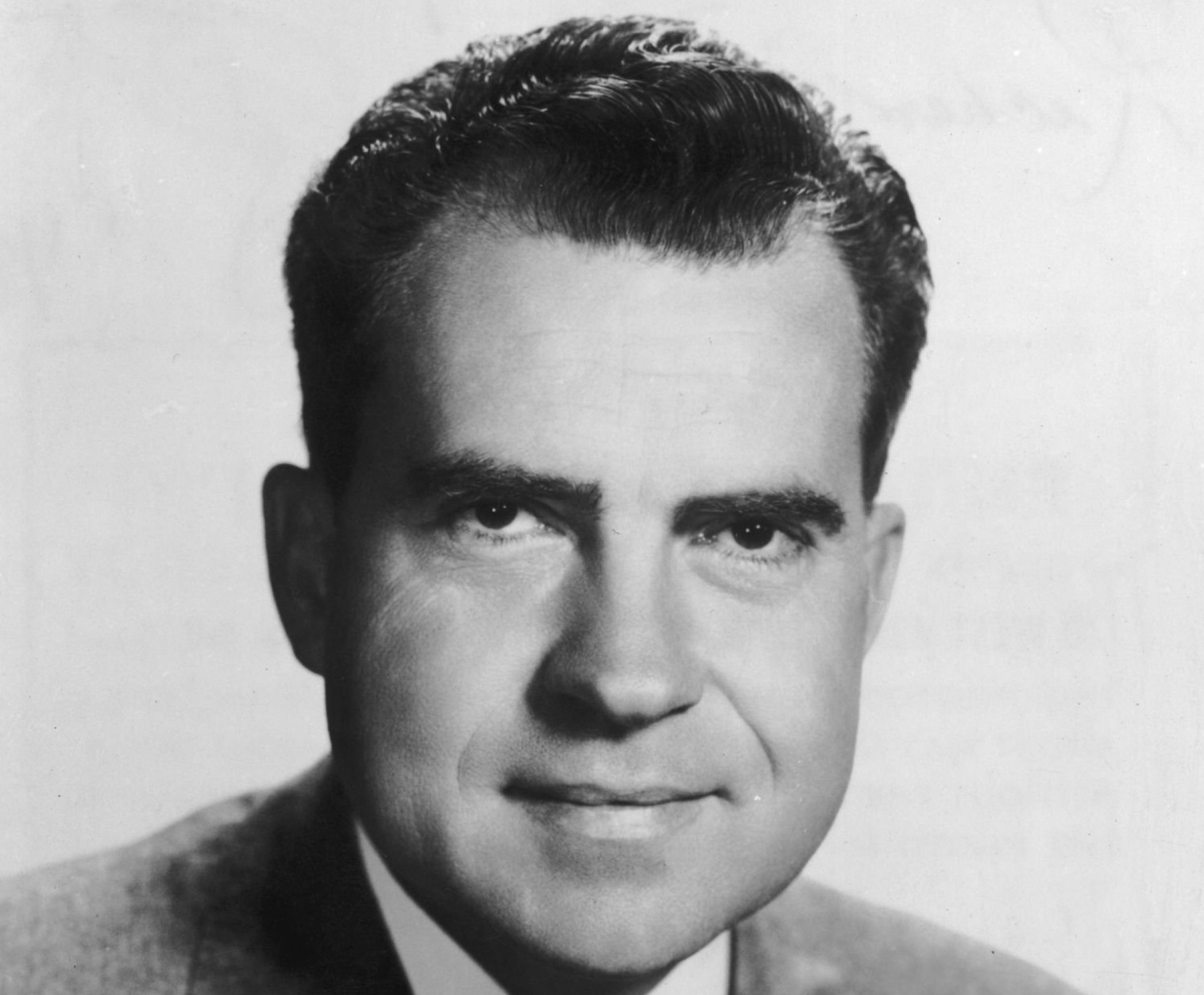 Grayscale Portrait Photo of Richard Nixon in Gray suit