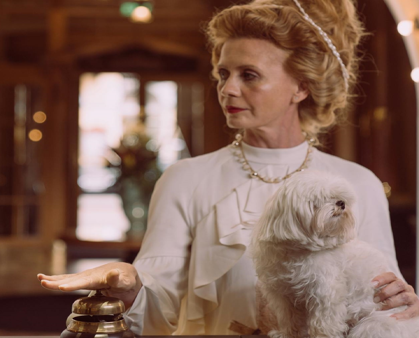 woman with dog in her hands