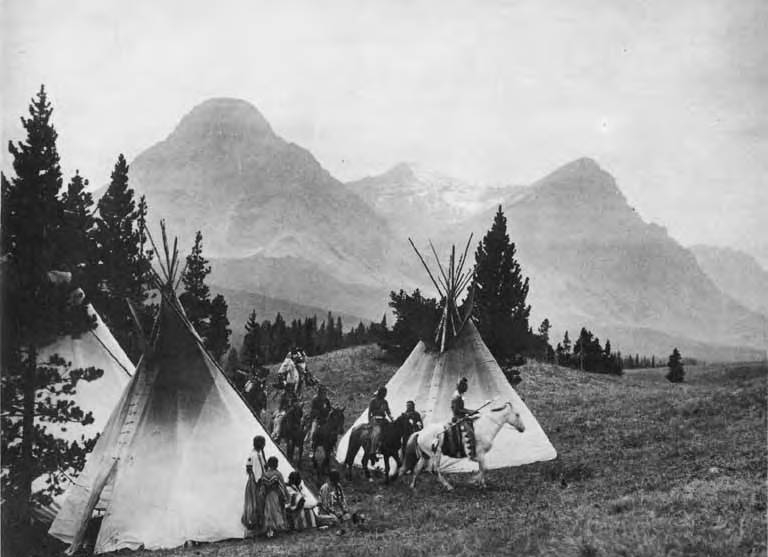 Group Of Piegan Blackfeet Men Riding On Horseback