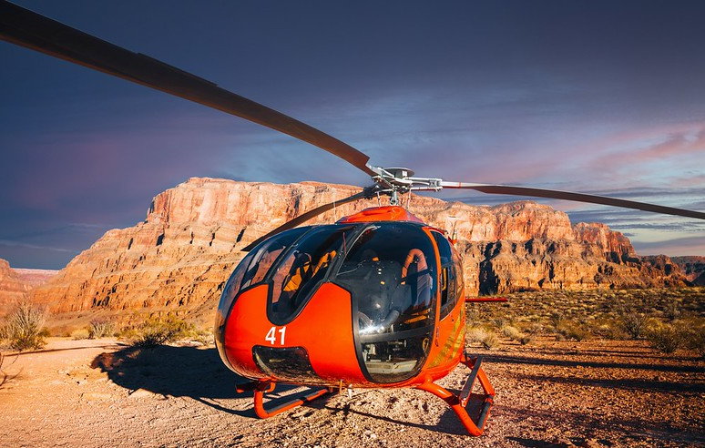 Landscape Photo of the Grand Canyon with a A helicopter in front