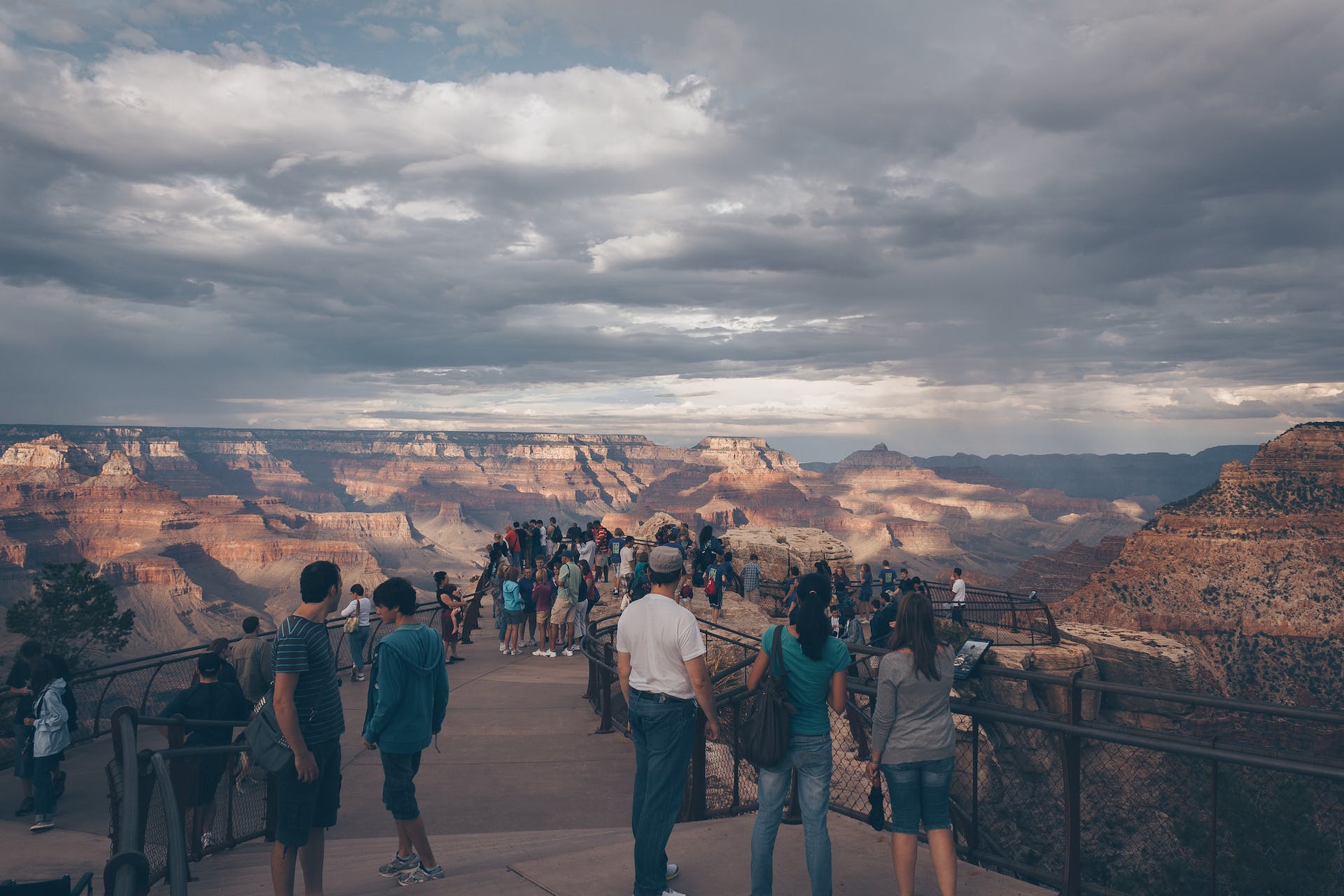 Landscape Photo of the Grand Canyon with people watching mountain at daytime