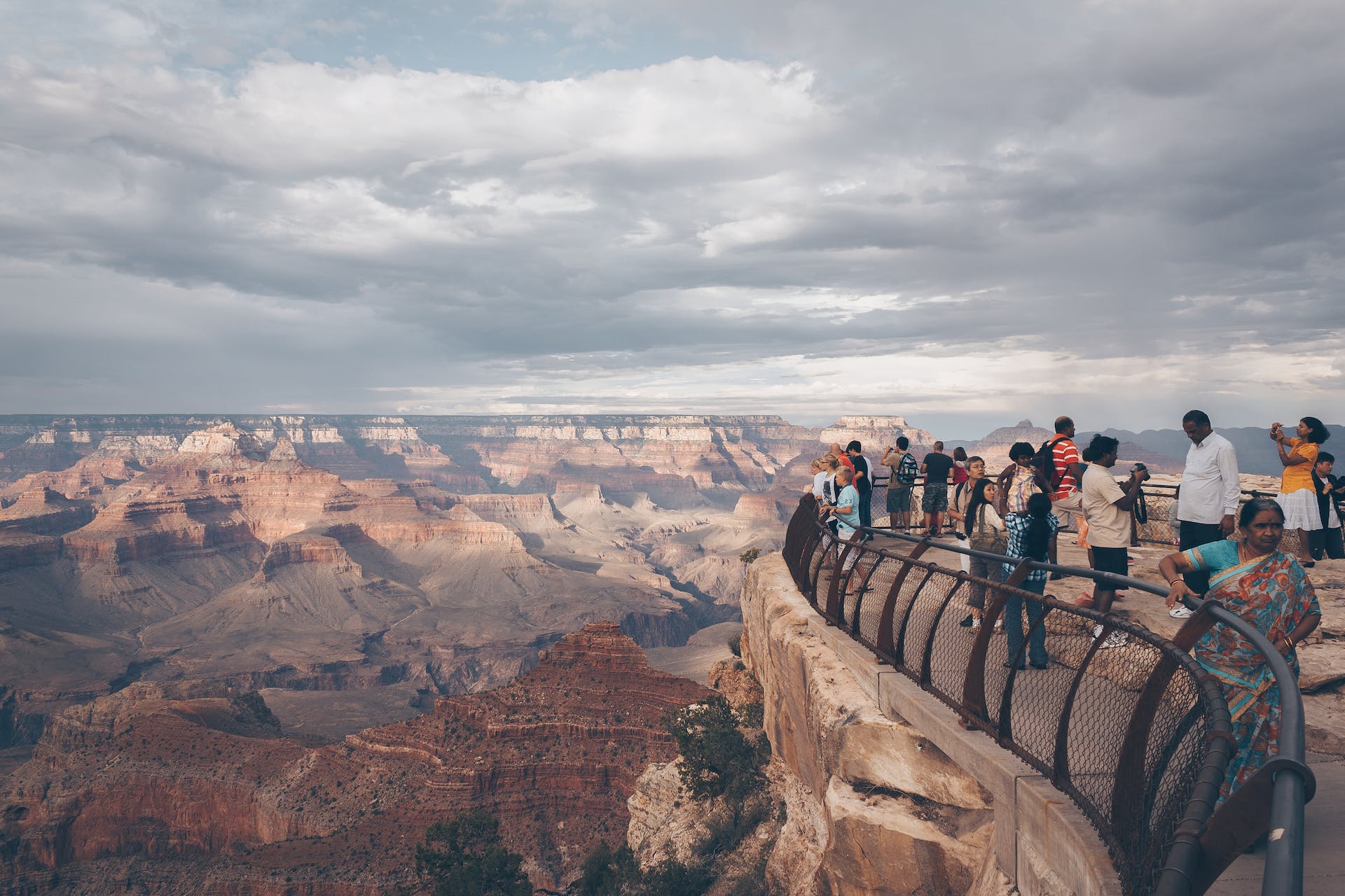 Landscape Photo of the Grand Canyon  people watching from top