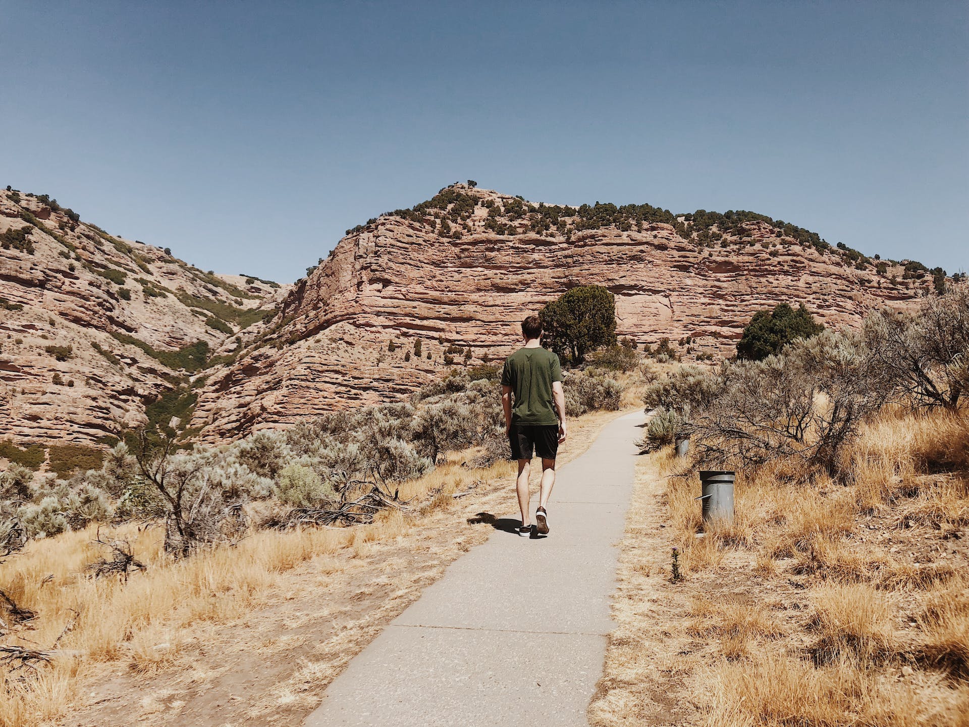 Landscape Photo of the Grand Canyon, man walking on pathway