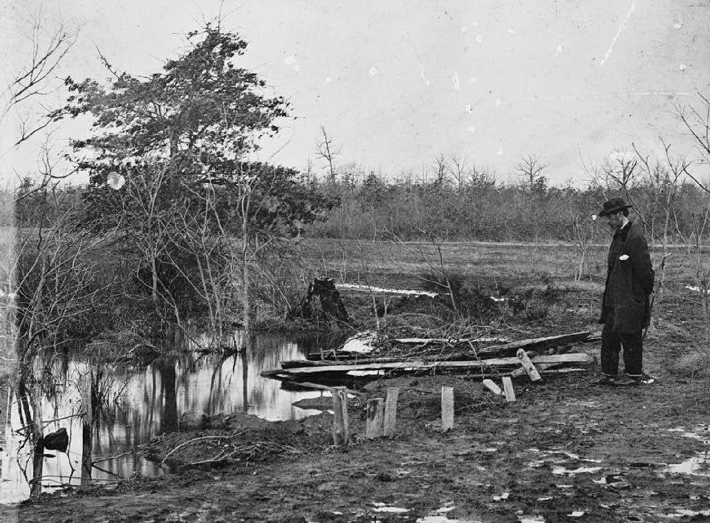 Man looking at pond - 1861