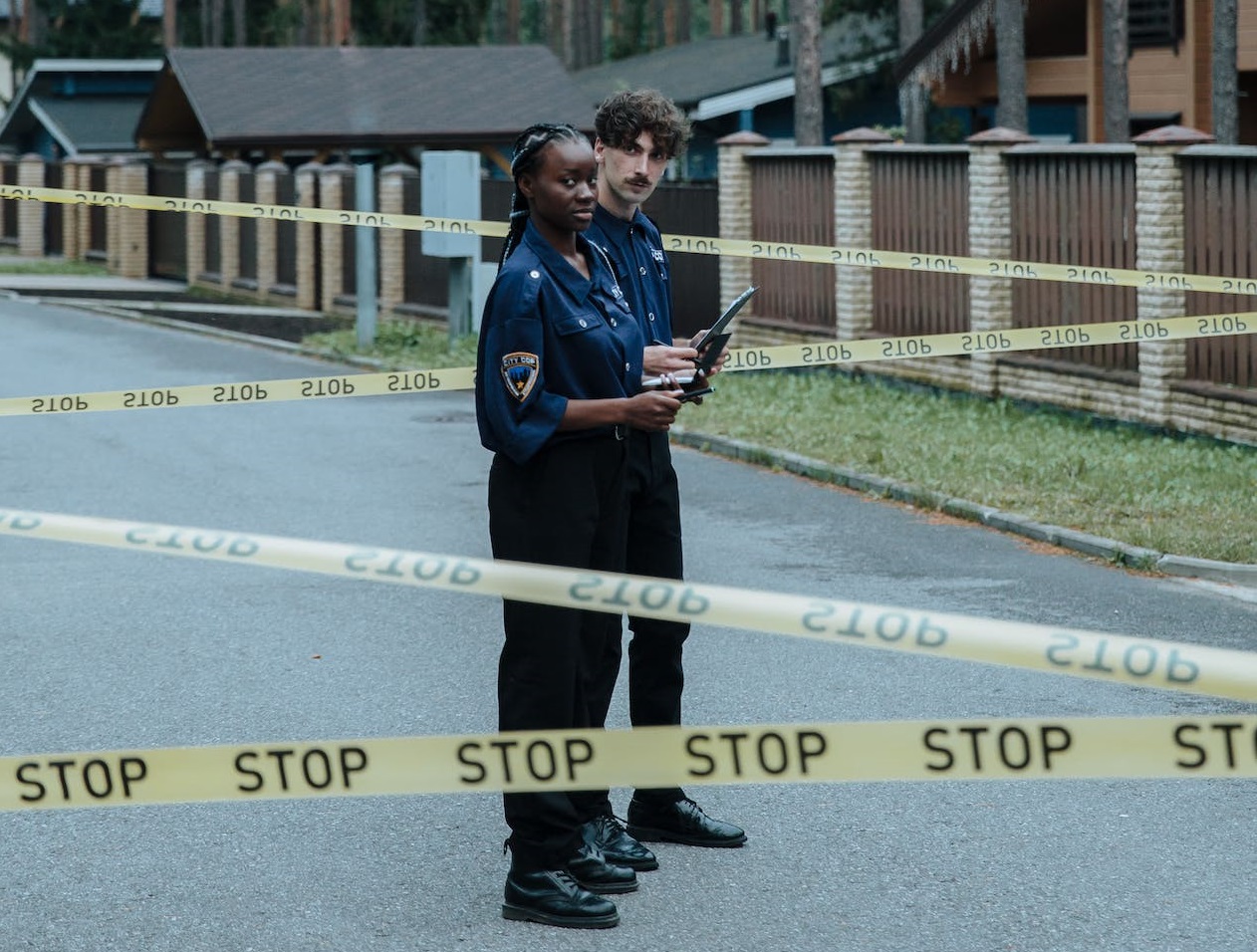 Police Officers investigating a case.