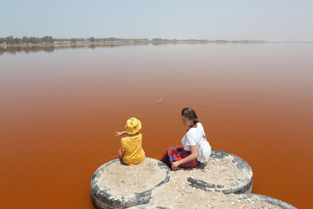 Tourists at shore of Lake Retba Senegal