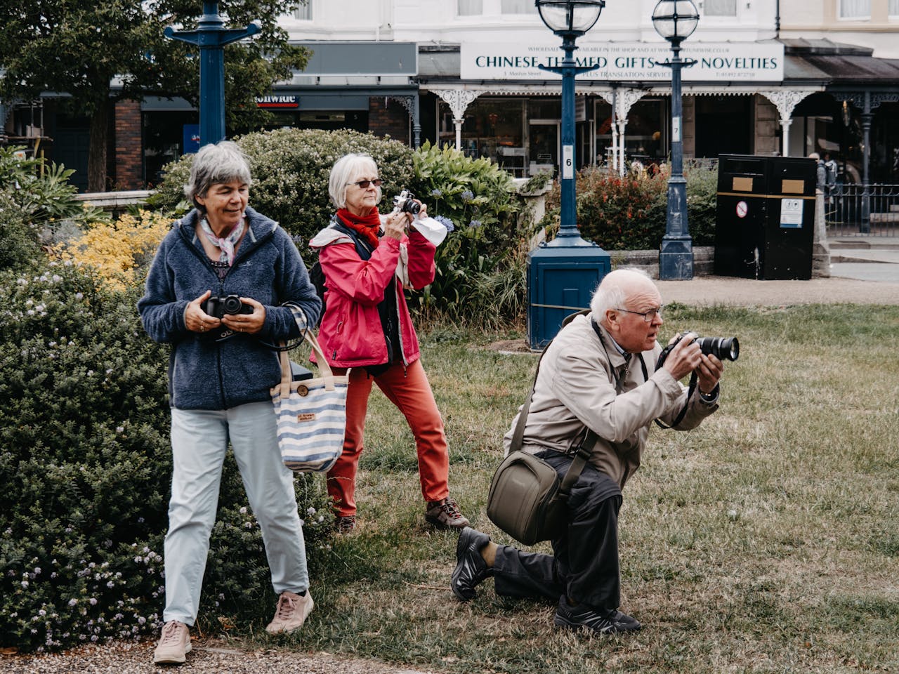Elderly tourists taking pictures.