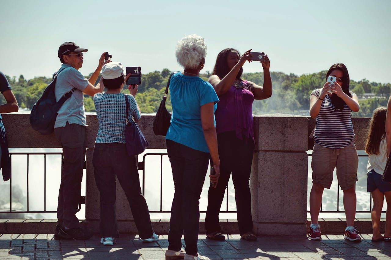 People taking pictures on the bridge.