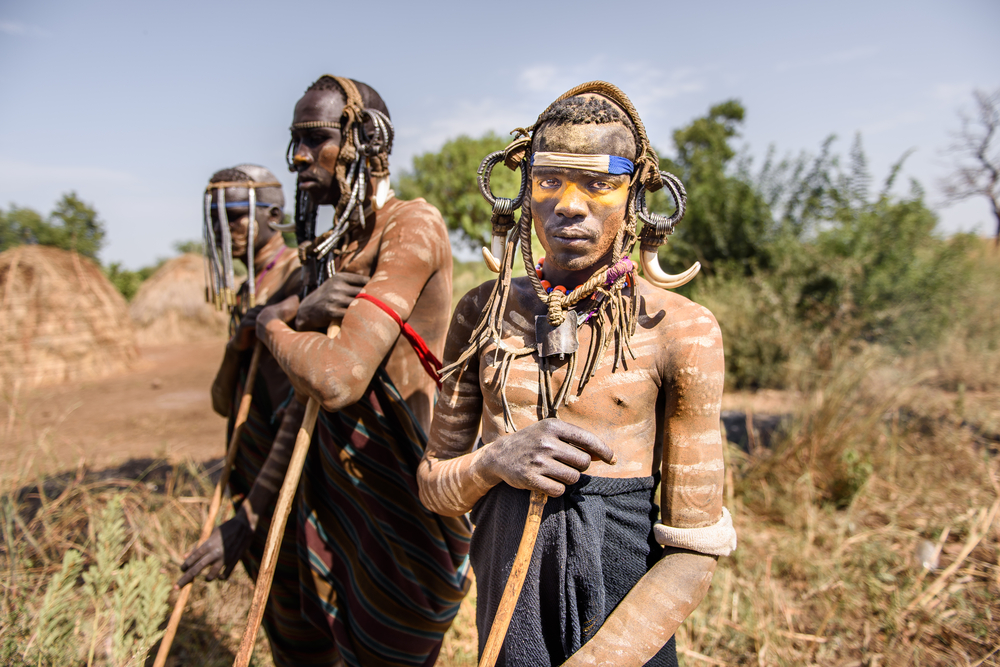 Unidentified Mursi man with body paint