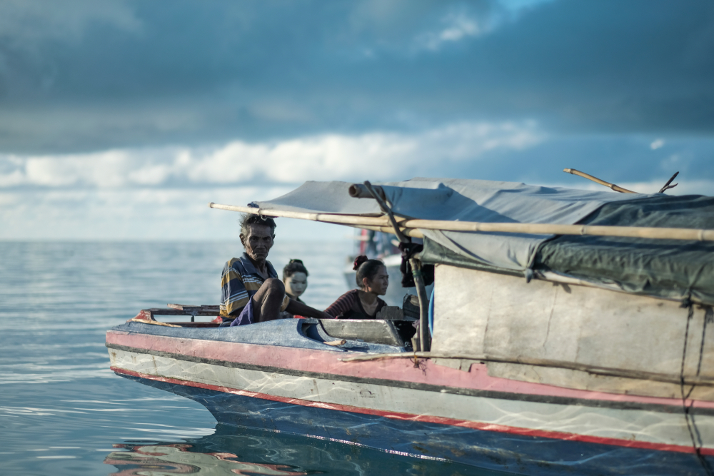 Sama-Bajau people on a boat